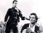 Mad Max (Mel Gibson / Max Rockatansky & Tim Burns / Johnny the Boy) - © 1979 Warner Bros.